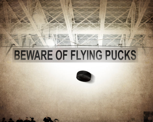Beware of Flying Pucks Photographic Art