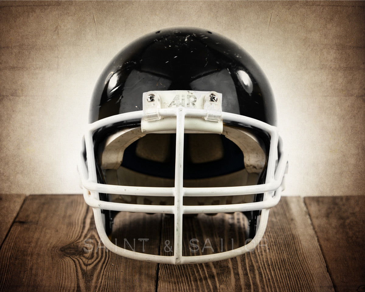 Vintage Black Football Helmet Facing Vintage Black Football Helmet Facing